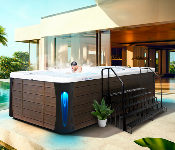 Calspas hot tub being used in a family setting - Caldwell